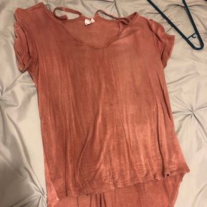 Pink top with cross cross design